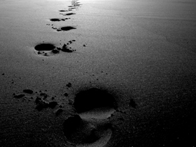 shoe prints in the sand